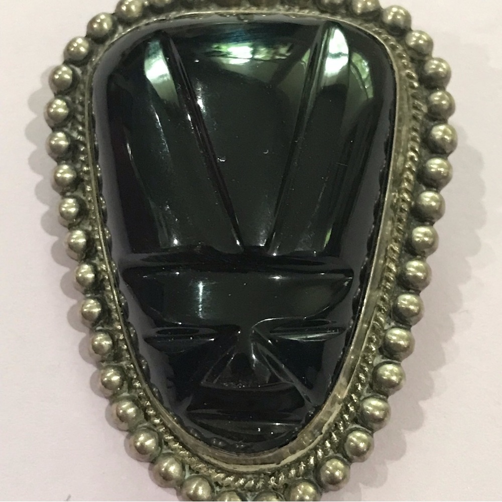 Mexico sterling and carved Mayan/Aztec face vintage brooch/pendant.